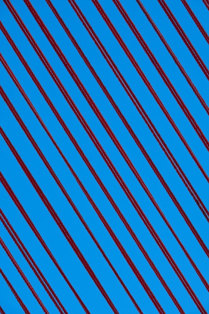 Blue background with red lines across it